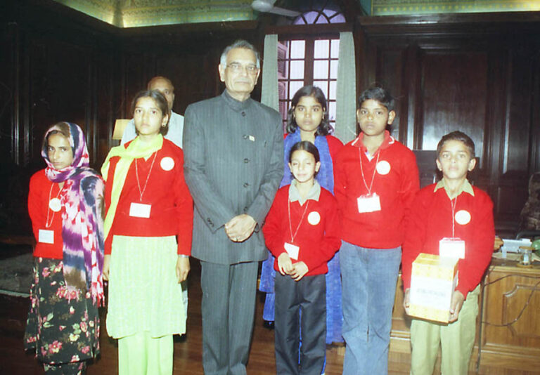 Shivraj Patil portrait, veteran Indian Congress leader and former Union Home Minister Lok Sabha Speaker, wearing white kurta with Congress shawl against Parliament background – death news 2025